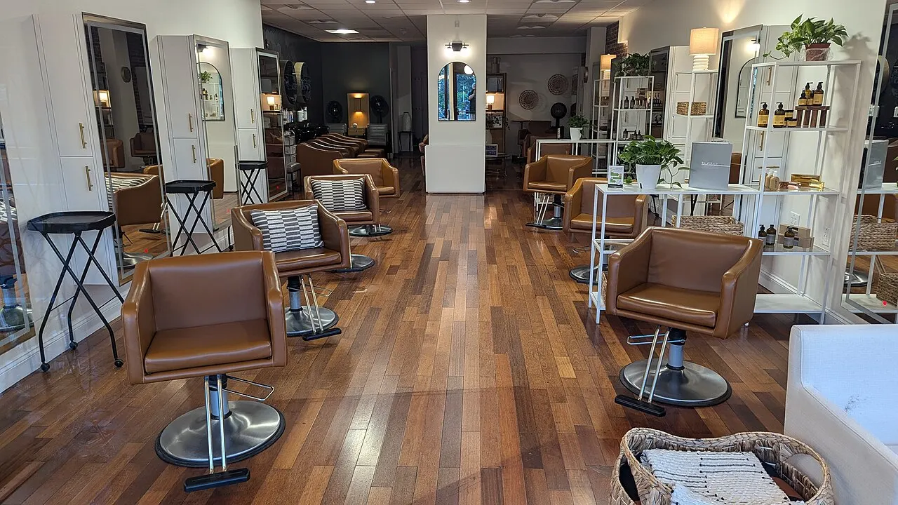Chairs and product shelves in a hair salon